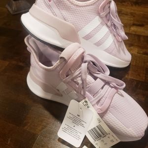 Brand new never worn women lavender colored Adidas..